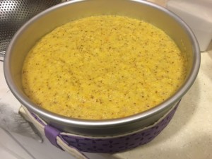 orange flourless cake before and after baking