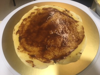 Thin layer of chocolate ganache