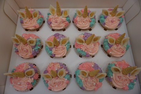 Unicorn cupcakes packed and ready to go for the birthday party