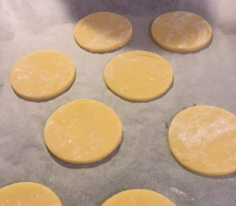 tart dough - rolled out and cut into round discs
