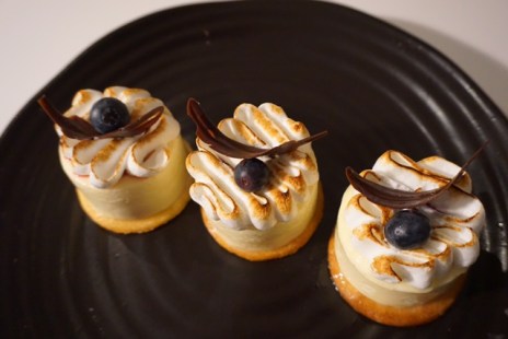 lemon meringue tart - decorated with blueberry and chocolate